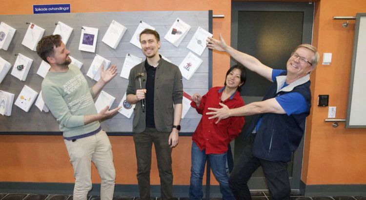 Joshua Dreyer is celebrated by his supervisors after the nailing ceremony Joshua Dreyer is celebrated by his supervisors after the nailing ceremony